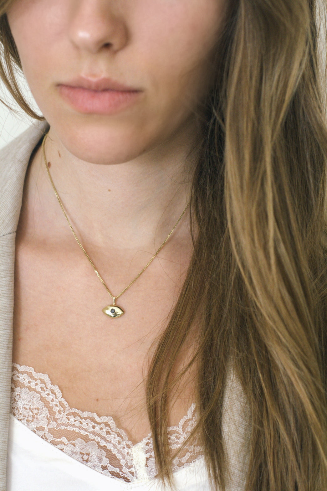 Elegant Enigma – Eye-shaped Gold Necklace - AlmaJewelryShop